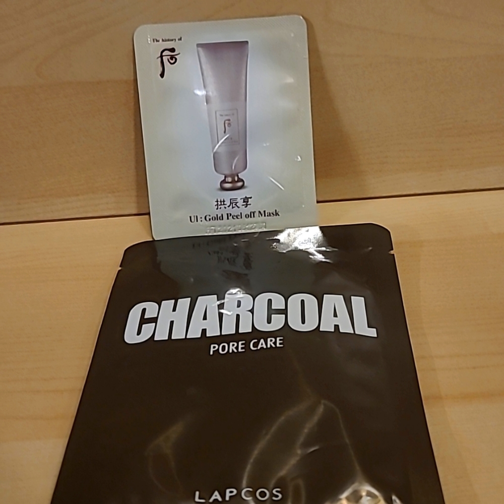 NIP gold and charcoal masks Lapcos and UI